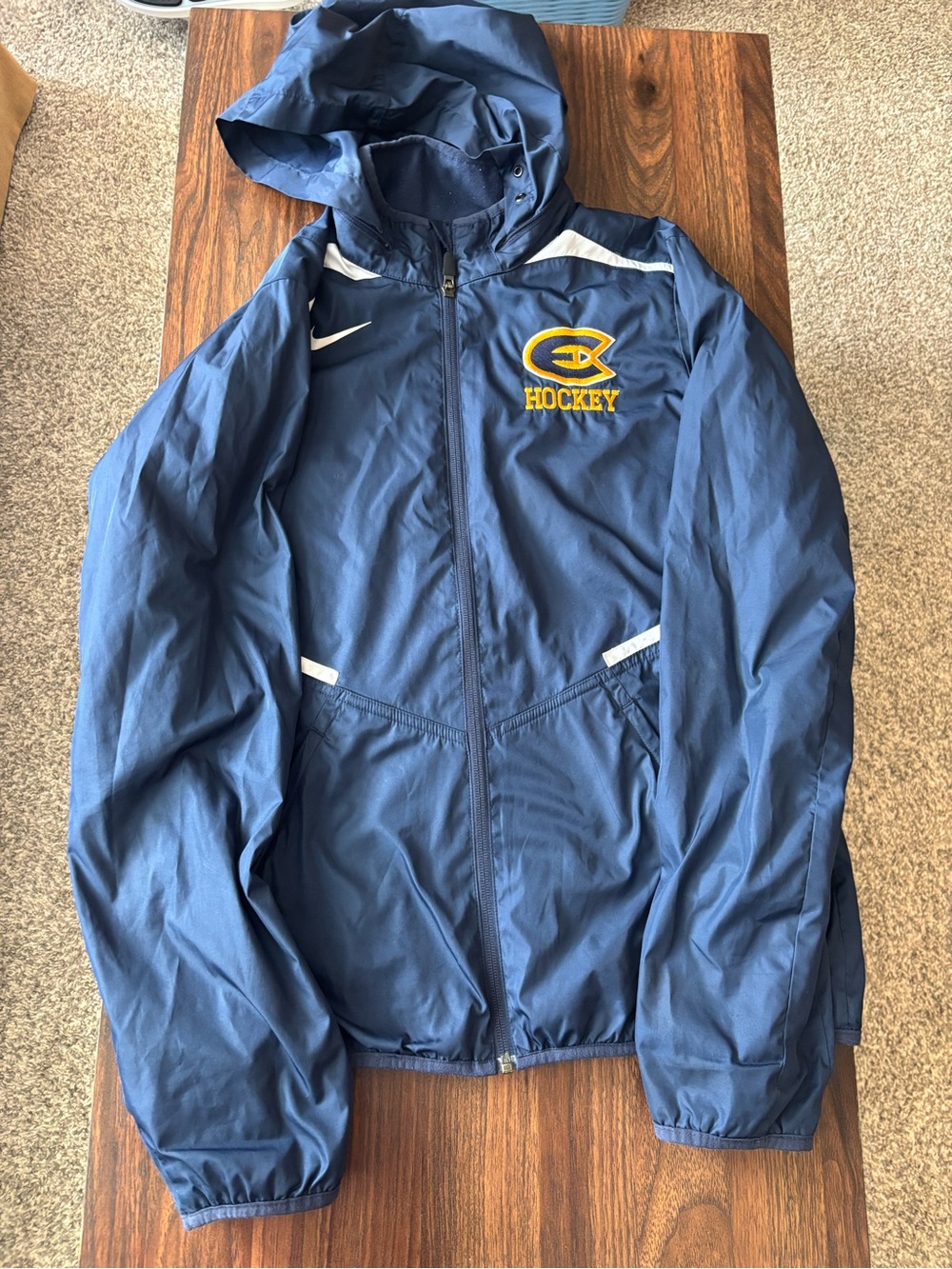 Nike Navy Storm-FIT Jacket with eau Claire hockey logo